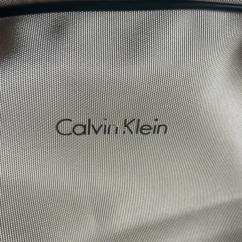 Calvin Klein roller luggage perfect for a carry-on use have some stain